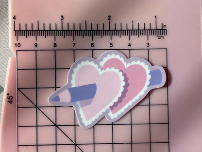 Pencil Pierced Heart | 2" Illustrated Matte Vinyl Sticker & Laptop Decal